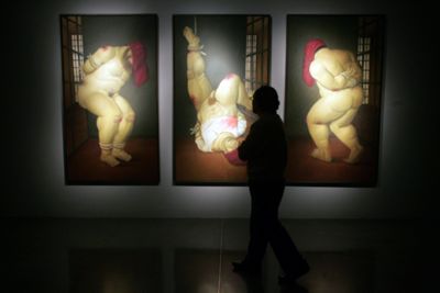 Three paintings in the Abu Ghraib prison series as displayed at the Parque Fundidora in Monterrey City, Mexico, January 2008 by Fernando Botero