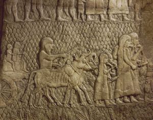 Captives with camel and baggage on their way into exile, detail of the Assyrian conquest of the Jewish fortified town of Lachish (battle 701 BCE), part of a relief from the palace of Sennacherib at Niniveh, Mesopotamia (Iraq) by Unknown Assyrian artist