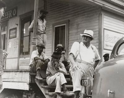 Plantation Overseer and His Field Hands, Mississippi Delta June 1936 by Dorothea Lange