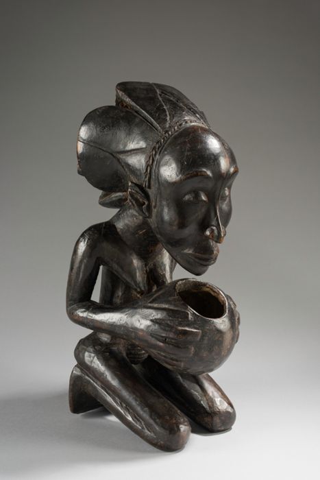 Bowl-Bearing Figure by Unknown Congolese artist 